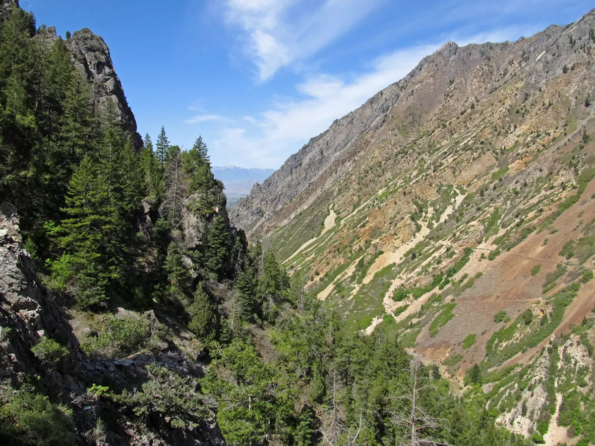 Rock walls and wooded slopes of American Fork Canyon viewed from the Timpanogos Cave entrance