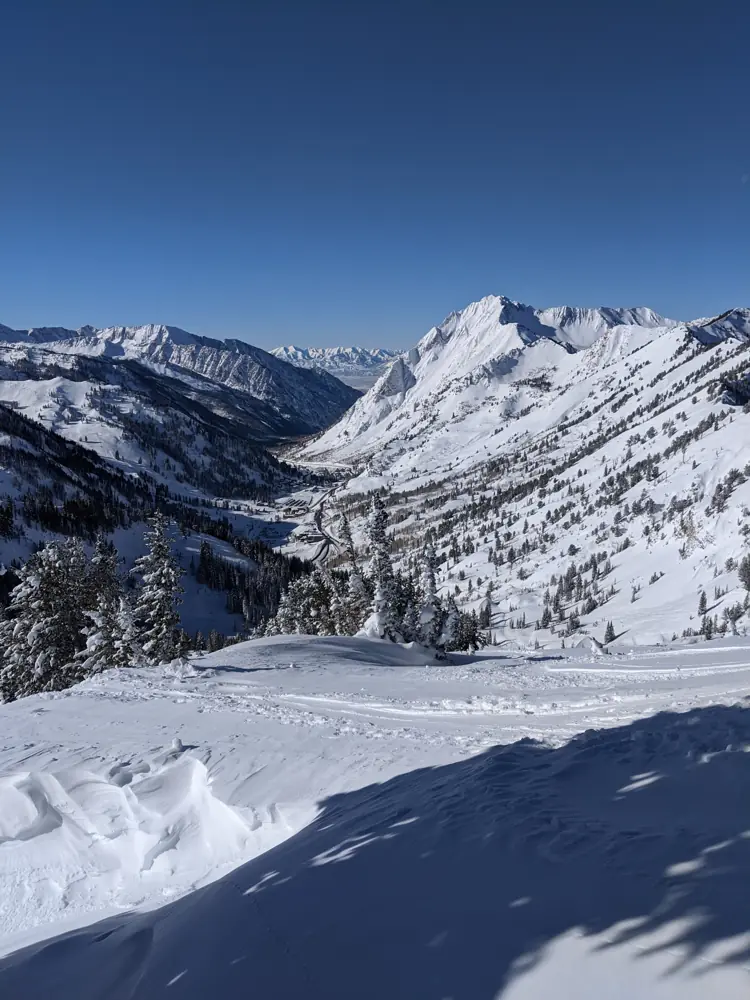 Snow-covered Little Cottonwood Canyon with Mount Superior on the right