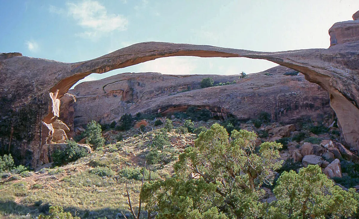 Landscape Arch spanning a rocky ridge in Arches National Park