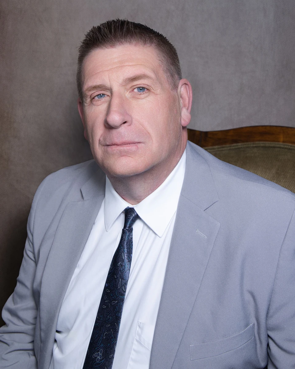 Official portrait of Brett Cragun from syracuseut.gov