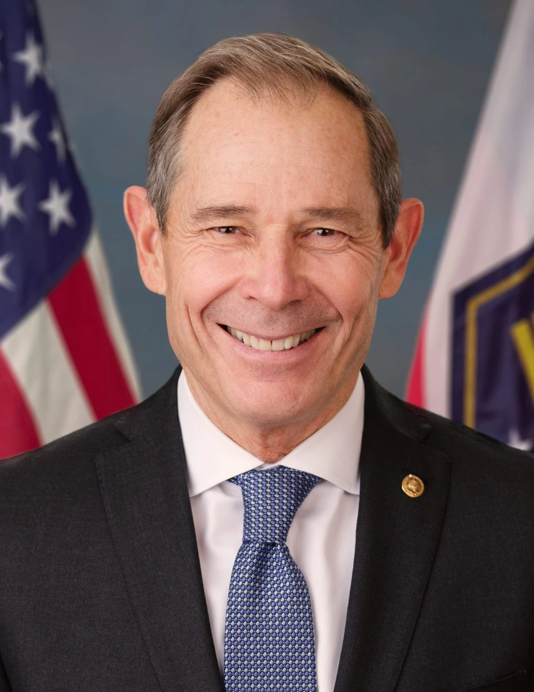 Official portrait of John Curtis dated 2025-01-08; file photo
