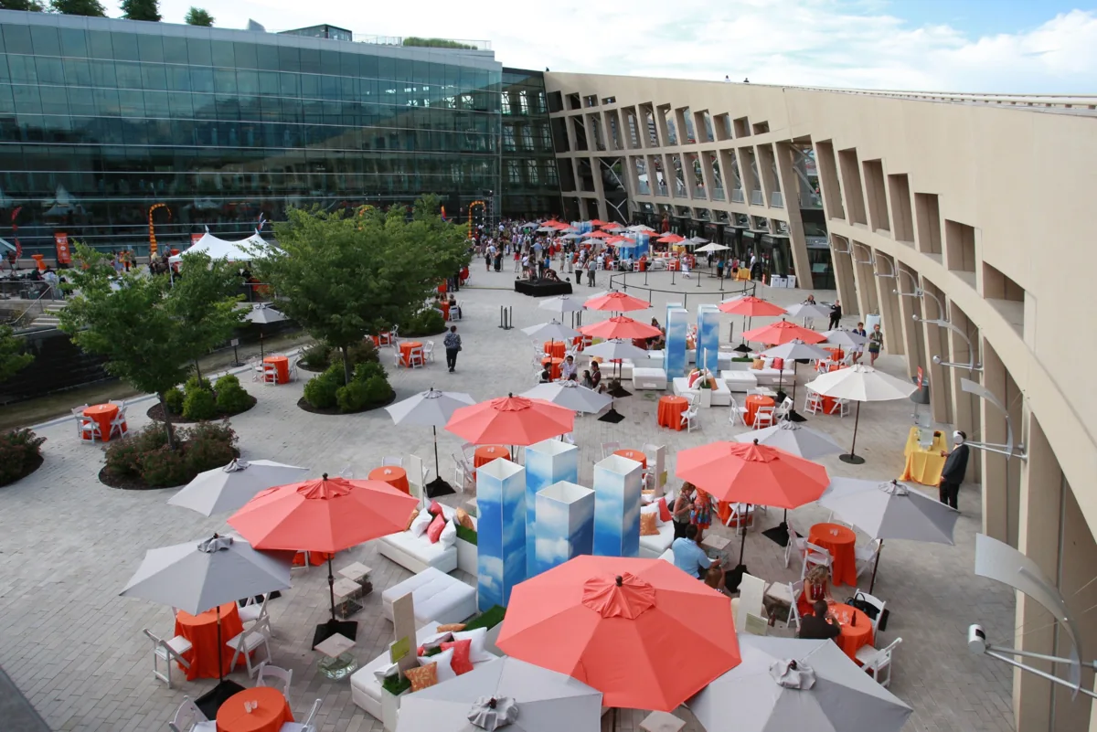 An elevated view of festival tables and tents beside the Salt Lake City Library