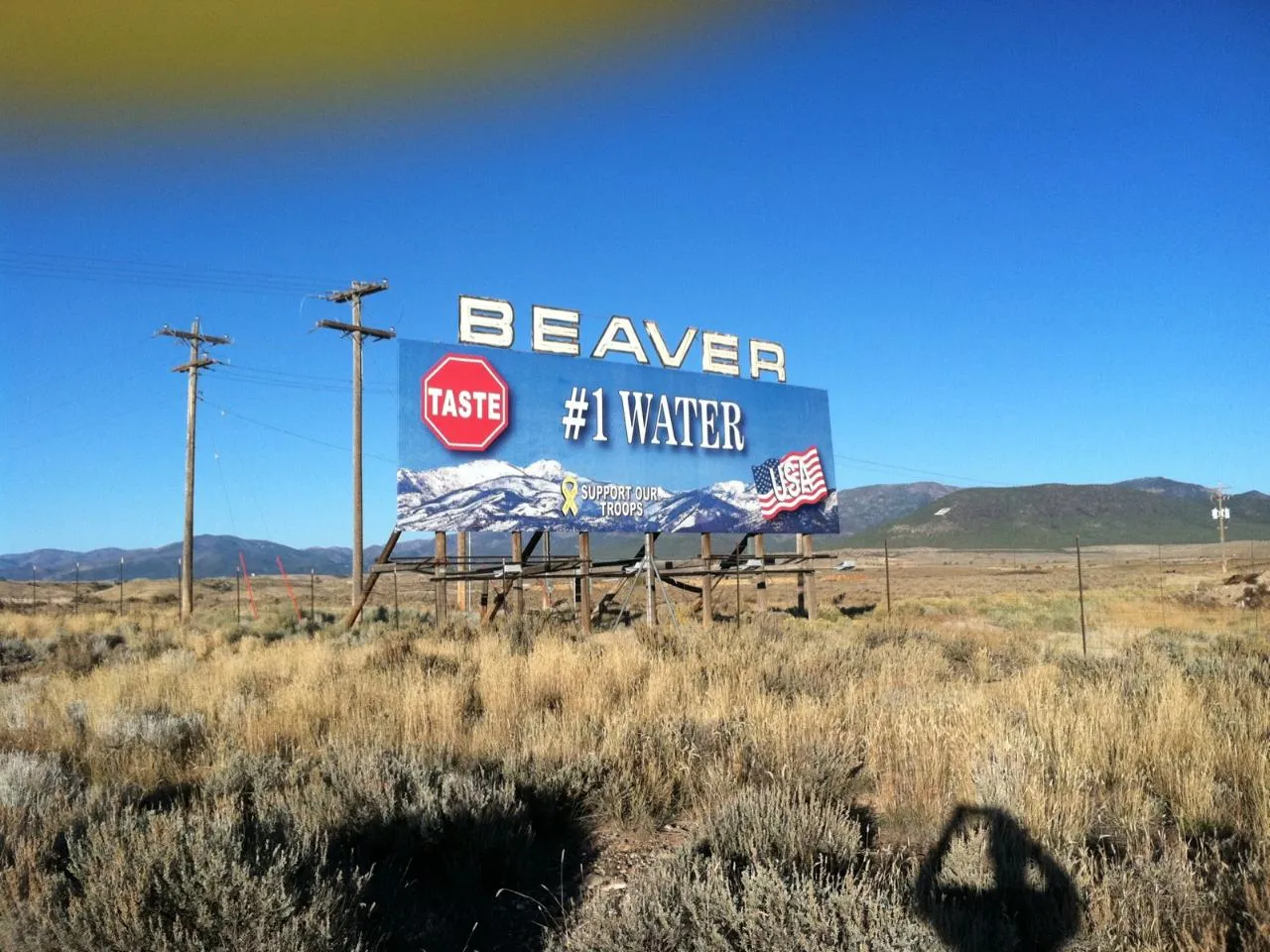 A welcome sign beside the road in Beaver