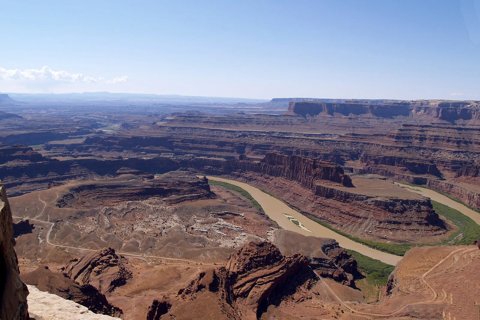 The Colorado River bends between layered canyon walls at Dead Horse Point State Park.