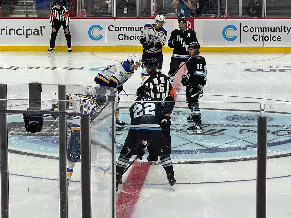 Logan Cooley (92) at a faceoff for the Utah Hockey Club against St. Louis in a September 2024 preseason game