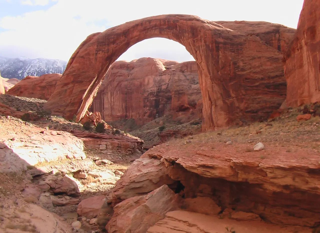 Rainbow Bridge, one of the world's largest natural bridges, arching over a side canyon of Lake Powell