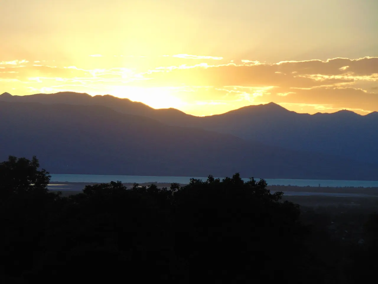 The sun setting over Utah Lake, seen from the foothills of Maple Canyon