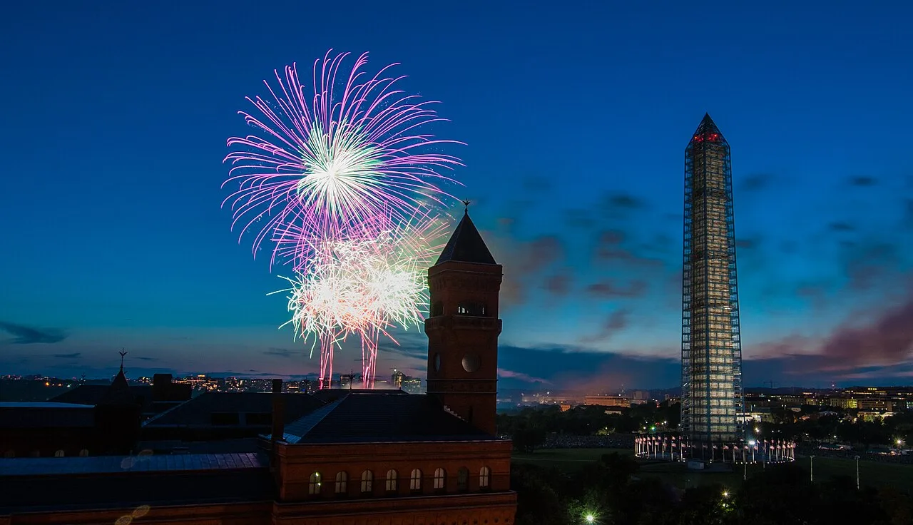 The Forest Service's Yates Building in Washington, D.C., in the foreground at left, with the Washington Monument and July Fourth fireworks behind